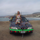 Illustration for article titled Groovalicious Purple Princess Of Peace Art Car Falls On Hard Times, Faces Crusher